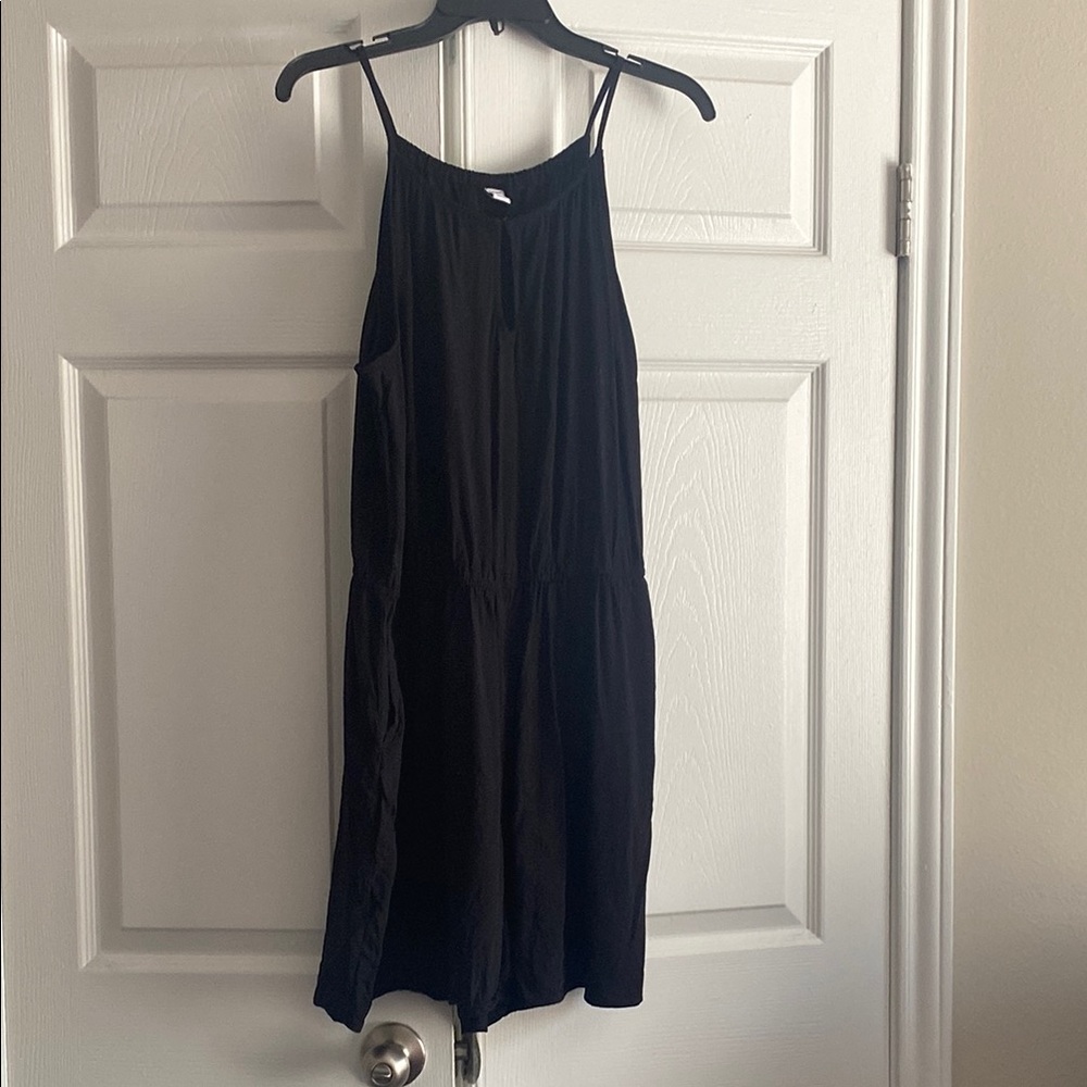 Solid black romper with pockets. Size XL
